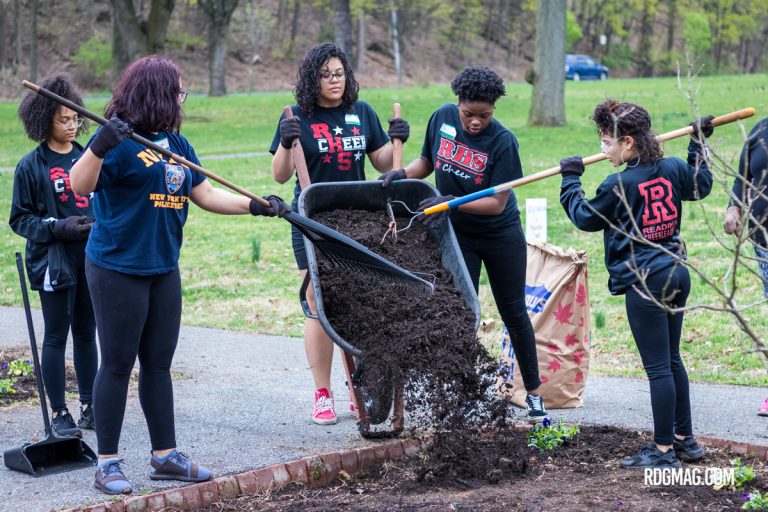 Student Volunteers Clean City Park for Global Youth Service Day