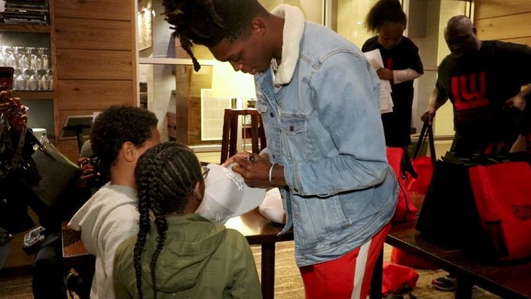 Lonnie Walker IV Gives Thanksgiving Turkeys to Families in Need