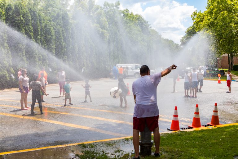 Hydrant Sprinklers give kids in Reading a break from the heat