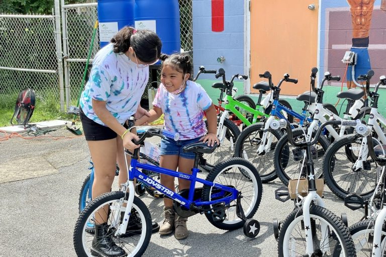 18 Children Earn New Bikes in ‘Books for Bikes’ Summer Reading Program